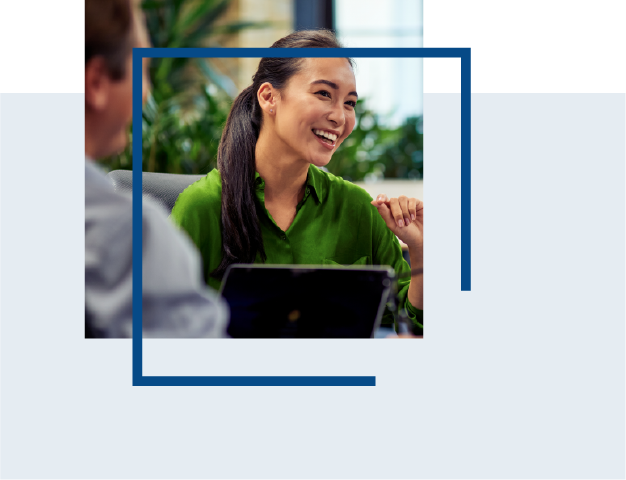 woman smiling with colleagues